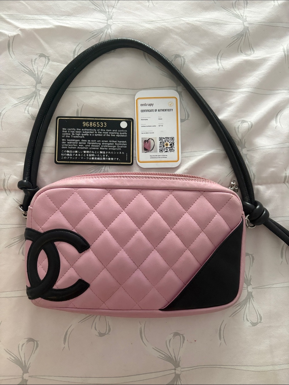 CHANEL Pink Quilted Shoulder Bag with Black Trim